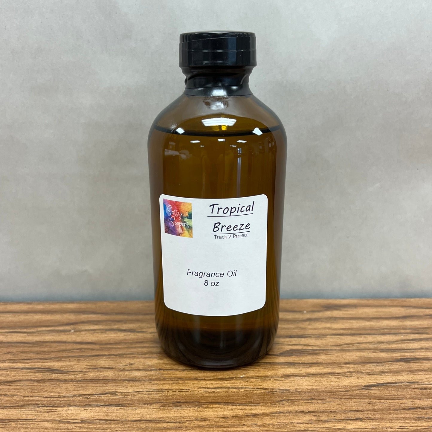 8 ounce brown bottle ofTropical Breeze fragrance oil for soapmaking