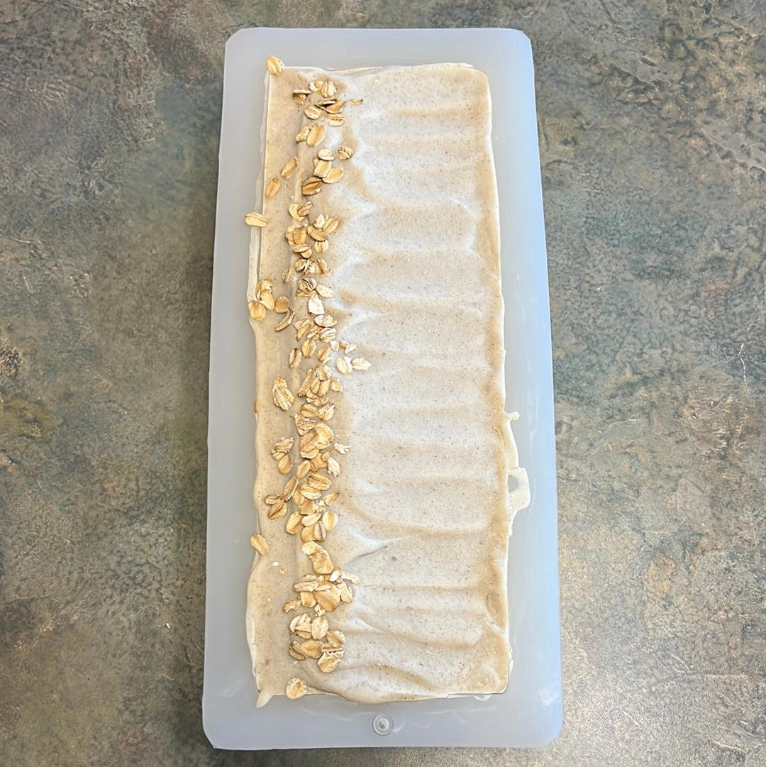 white 10 inch soap mold with soap in it