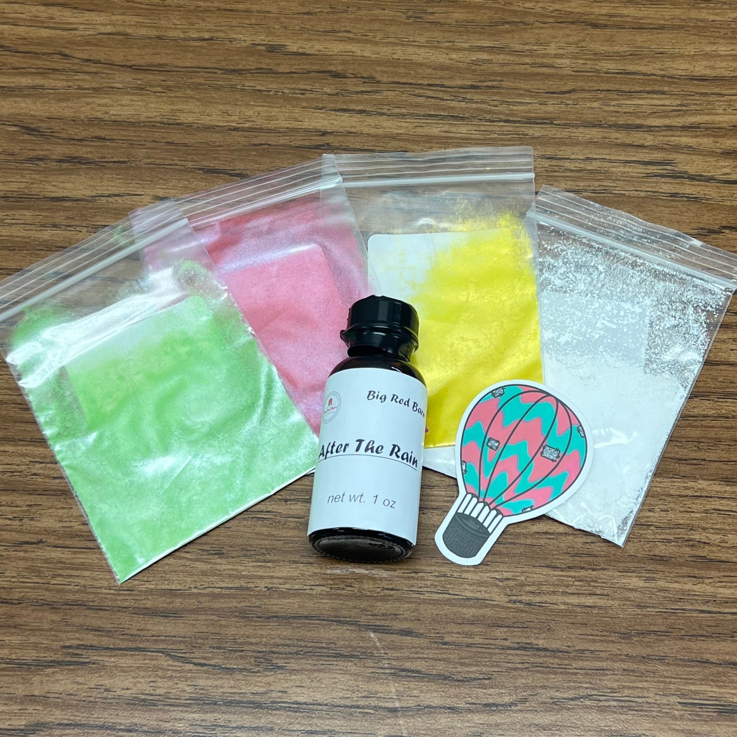 Spring Rain Soap Making Kit including 1 ounce of fragrance oil and 4 colorants.