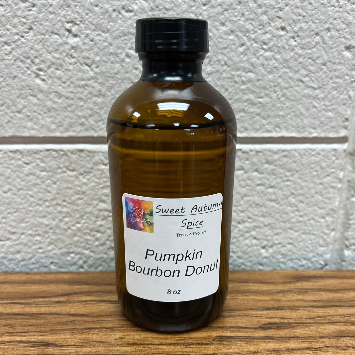 8 oz brown bottle of Pumpkin Bourbon Donut fragrance oil