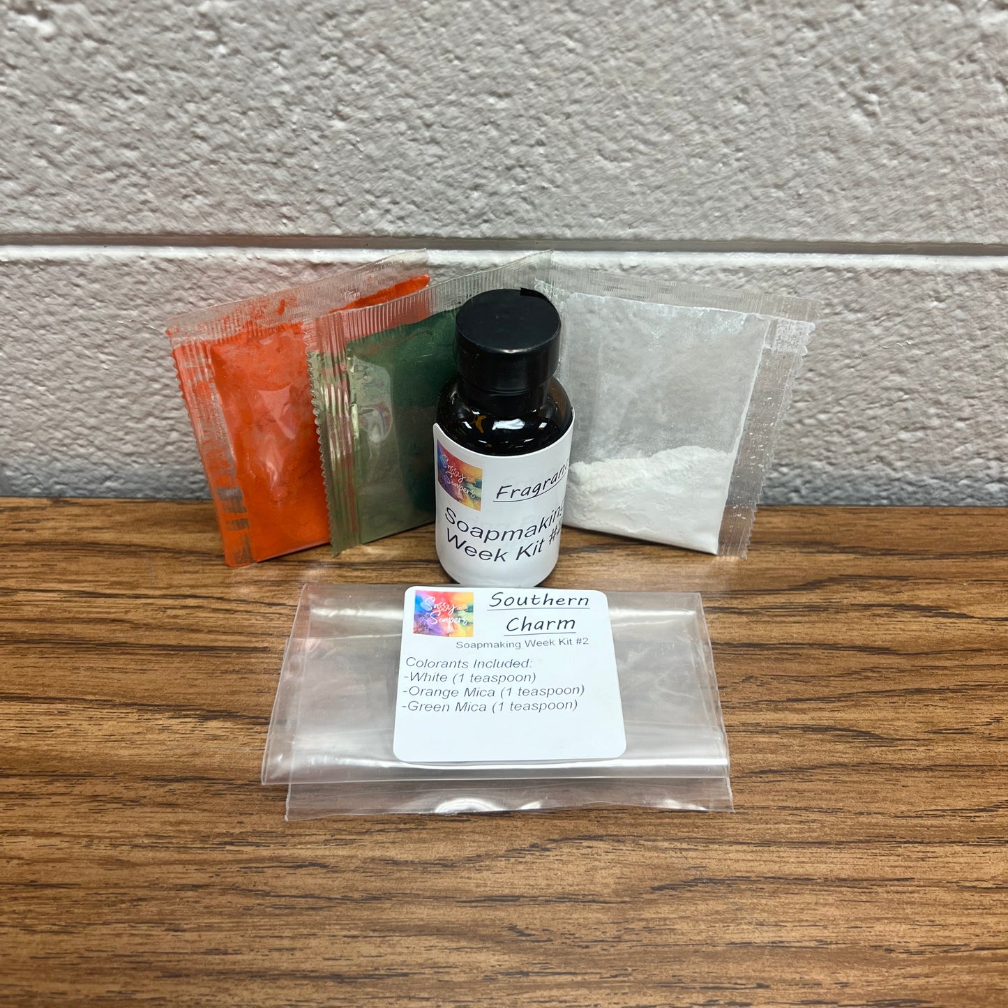 Bottle of fragrance oil and colorants for soap making