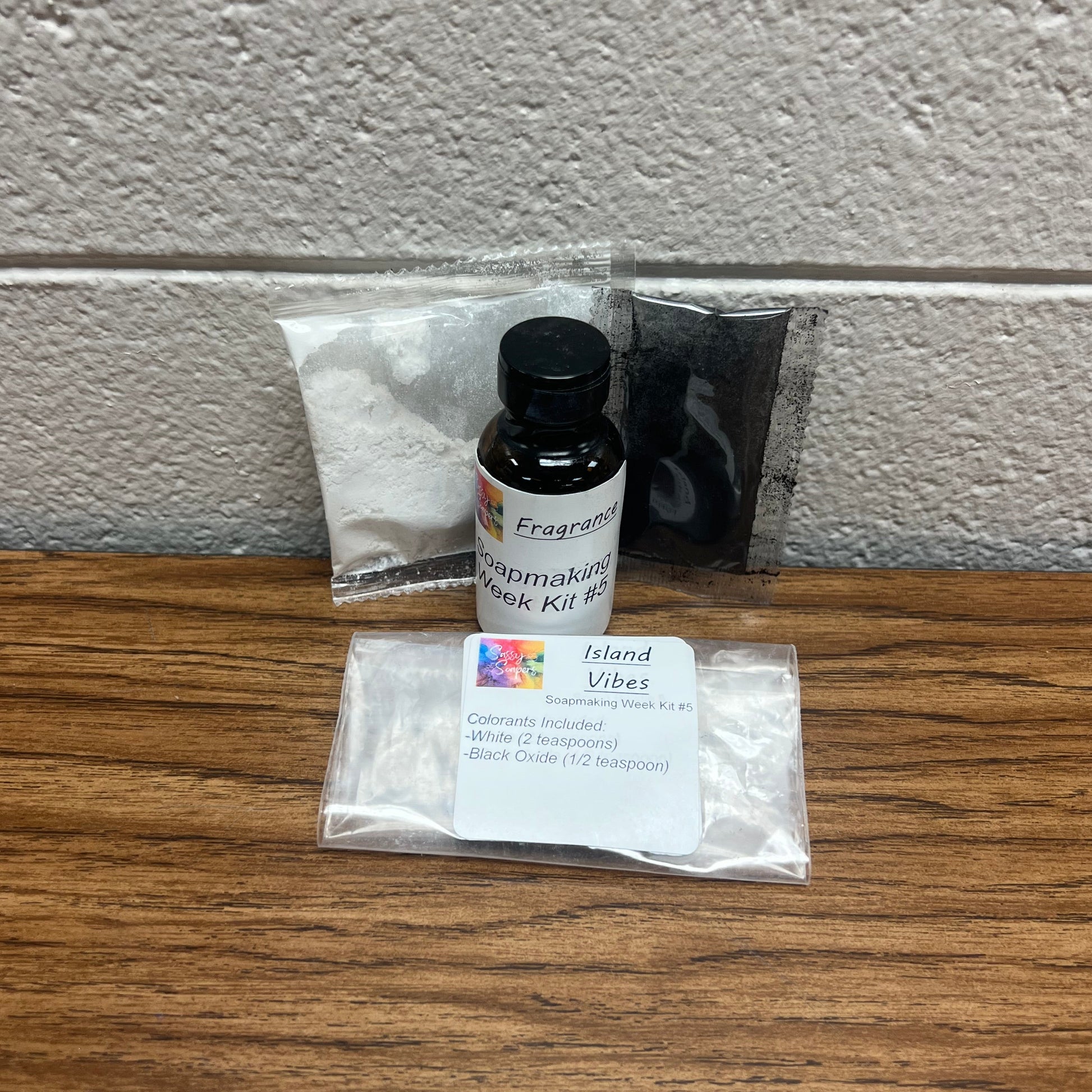 Bottle of fragrance oil and colorants for soap making