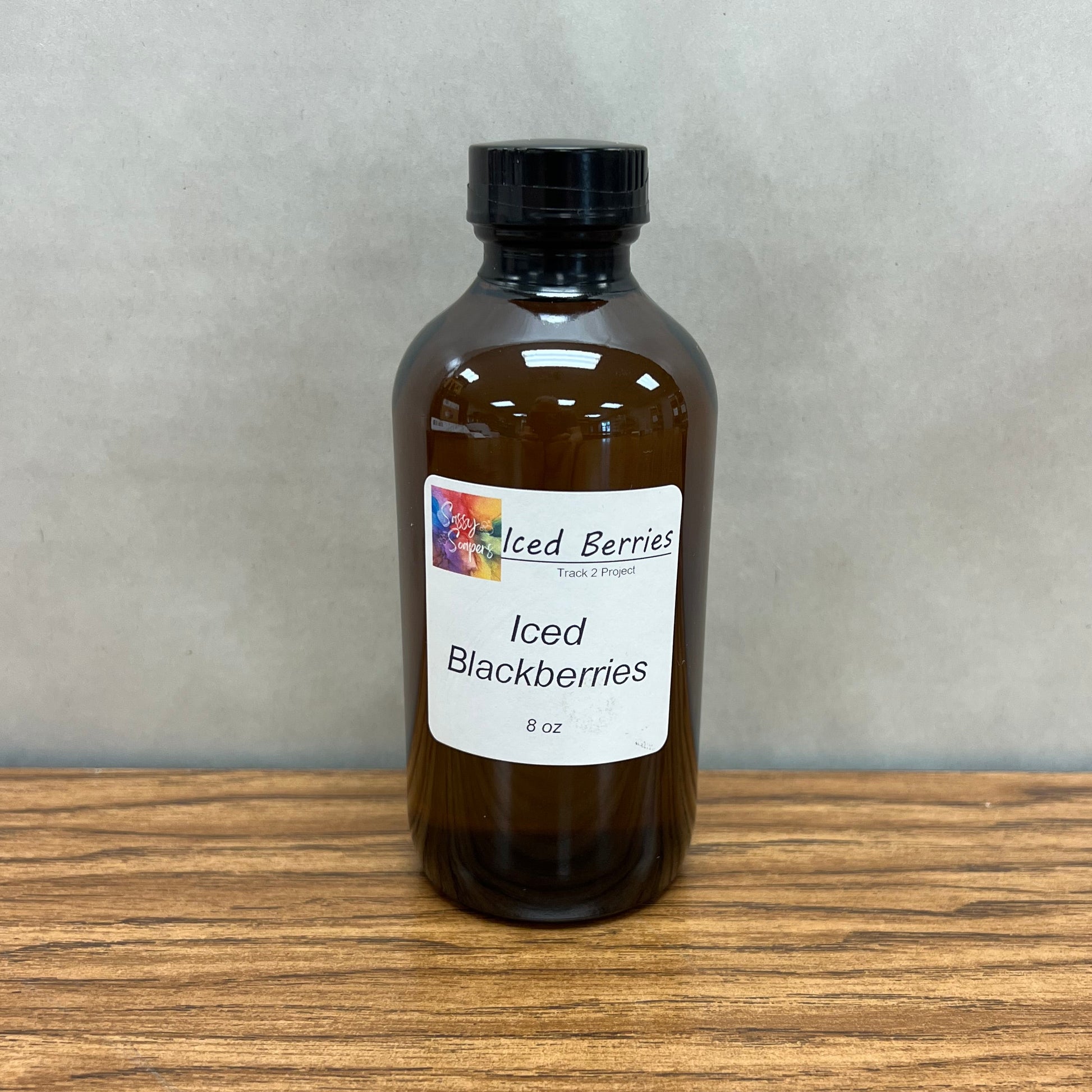 8 ounce brown bottle of Iced Blackberries fragrance oil for soapmaking.