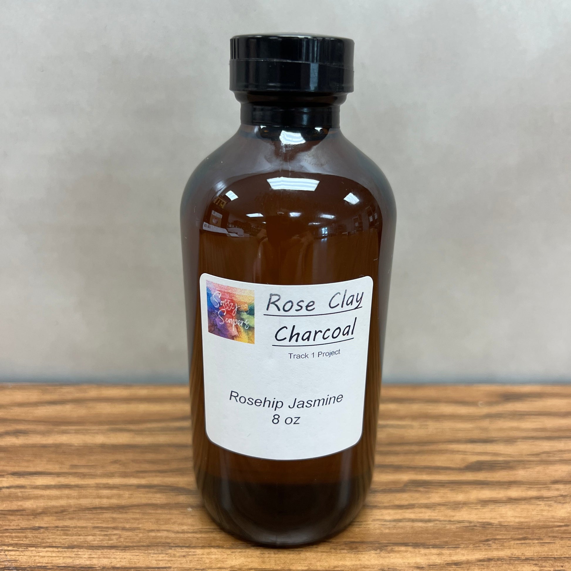 8 ounce brown bottle of Rosehip Jasmine fragrance oil for soapmaking.