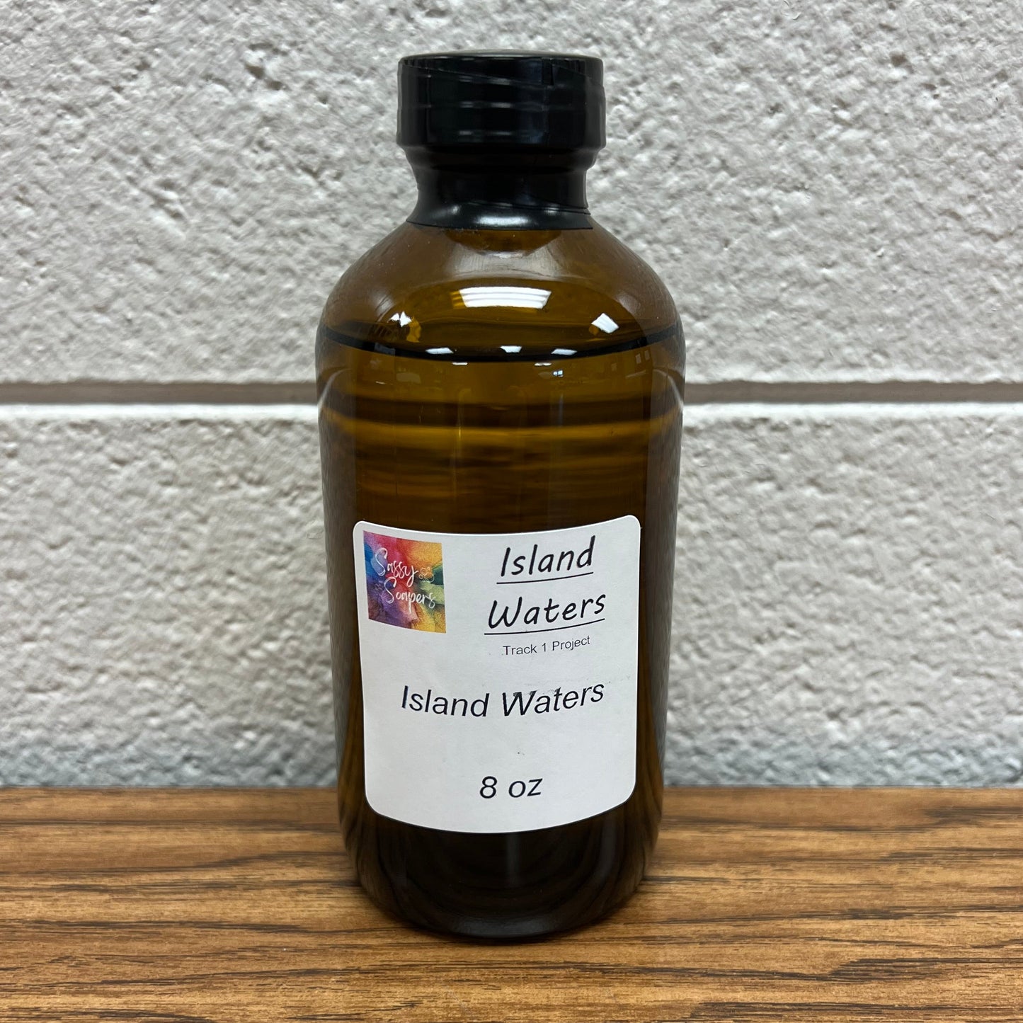 8 oz brown bottle of Island Waters fragrance oil