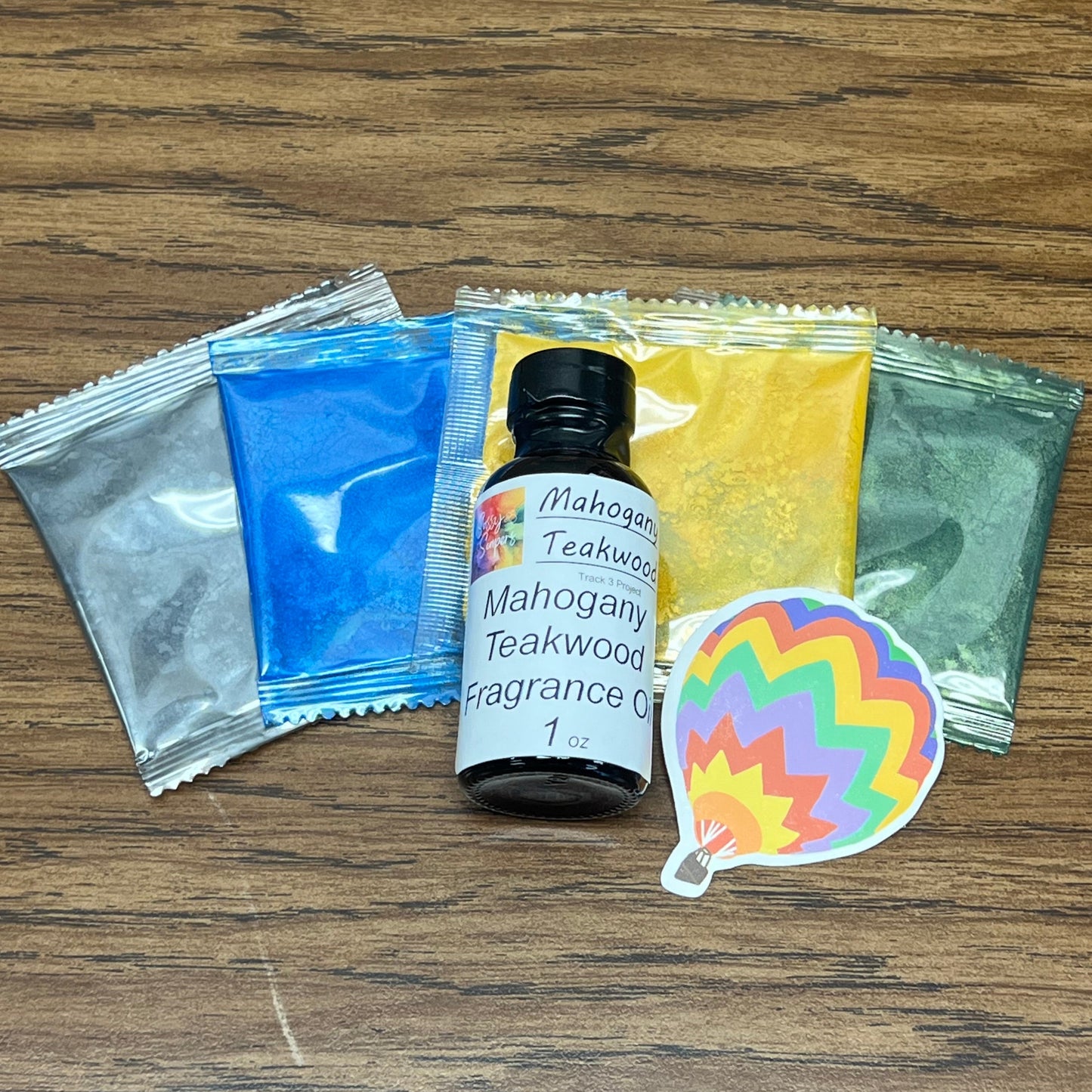 Full Moon Soap Making Kit including 1 ounce of fragrance oil and 4 colorants.