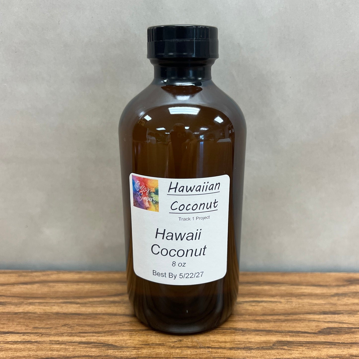 8 ounce brown glass bottle of Hawaii Coconut fragrance oil for soapmaking.