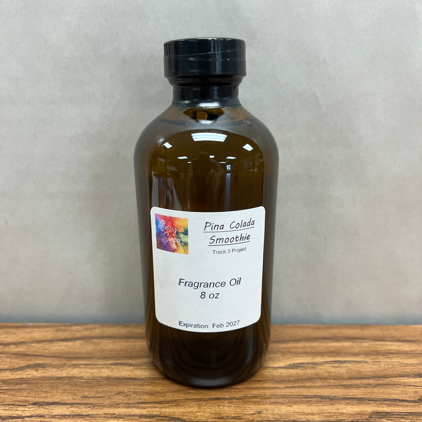 8 ounce brown bottle of Pina Colada Smoothie fragrance oil