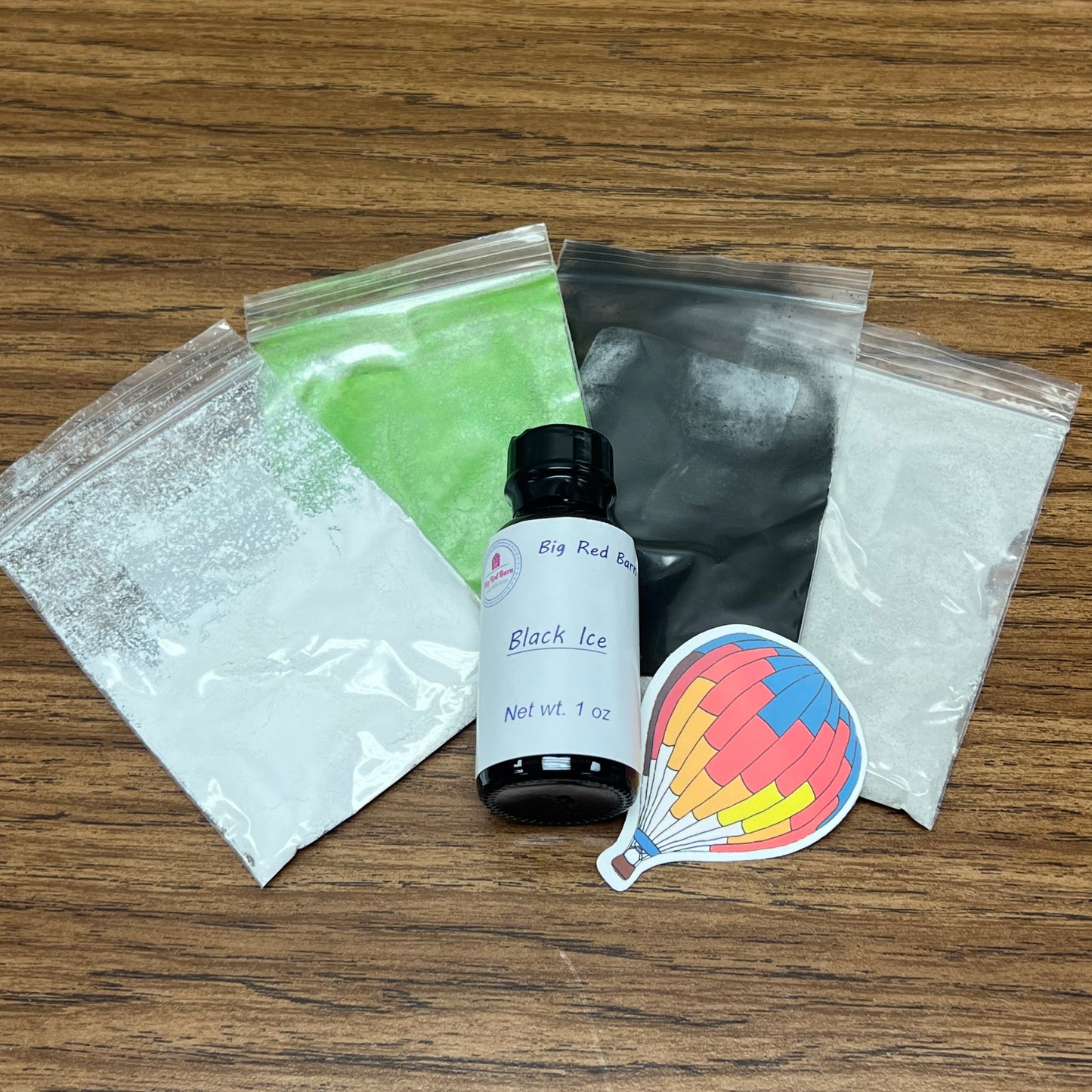 Black Ice Soap Making Kit including 1 ounce of fragrance oil and 3 colors and pumice.