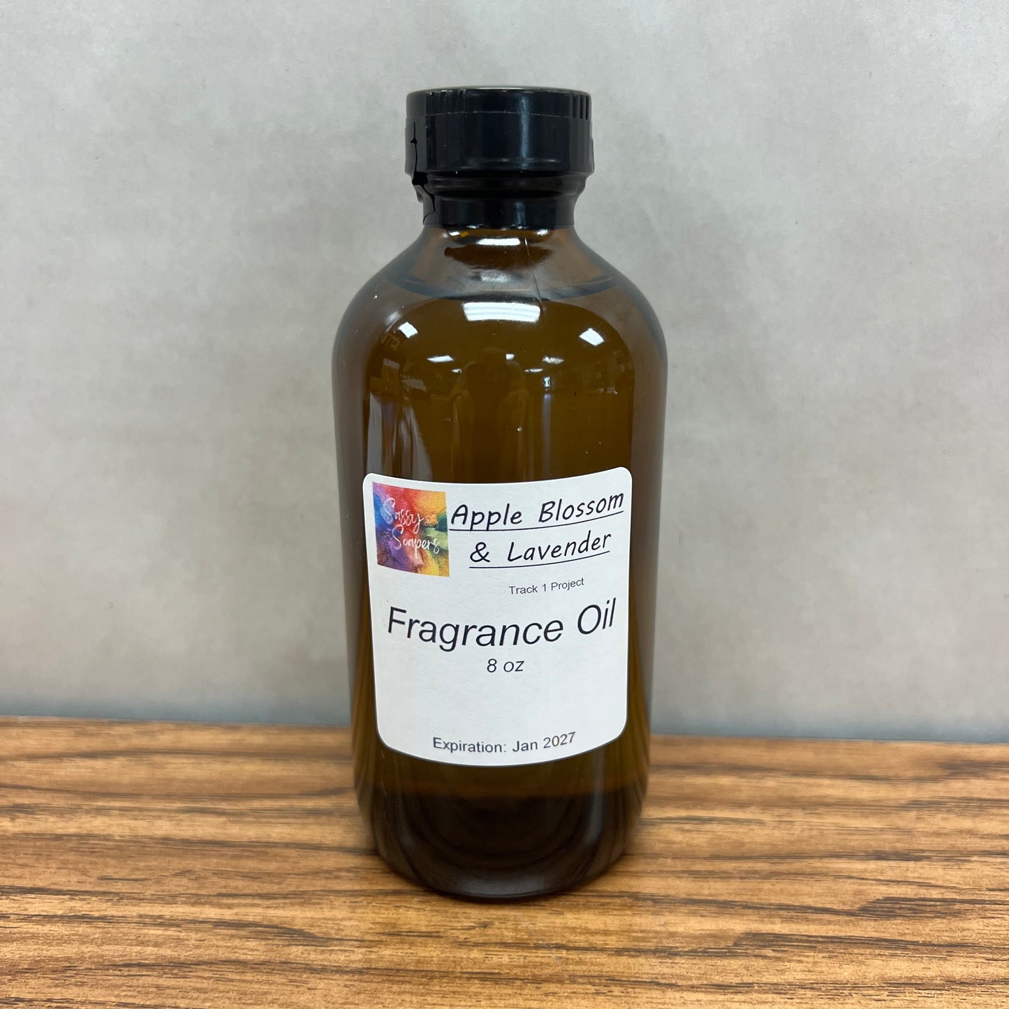 8 ounce brown bottle of Apple Blossom Lavender fragrance oil.