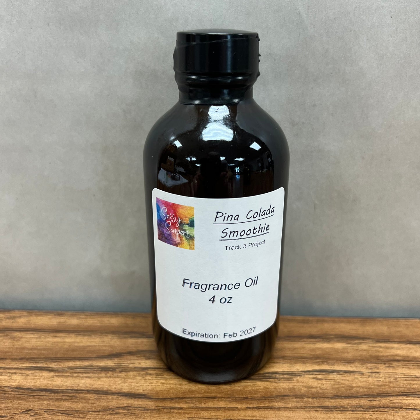4 ounce brown bottle of Pina Colada Smoothie fragrance oil