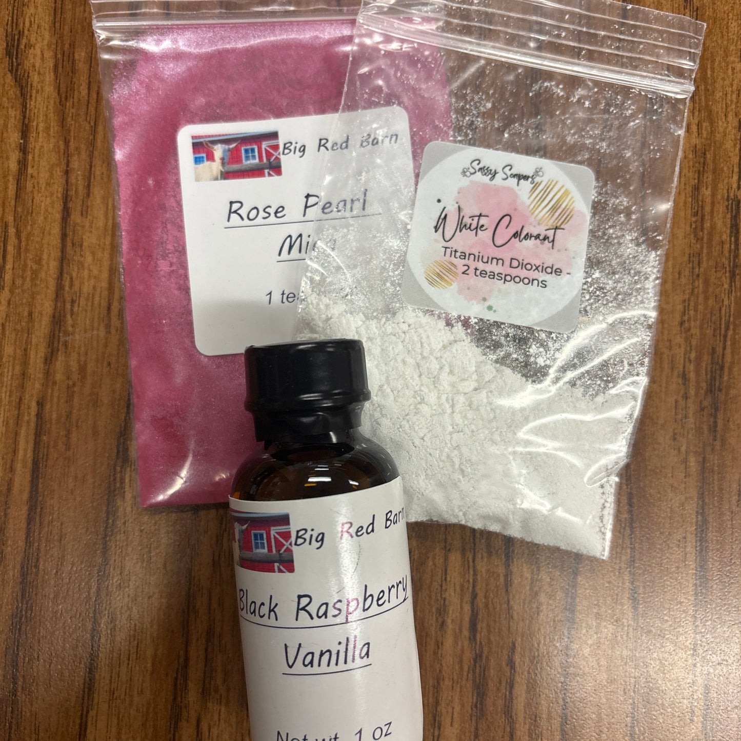 Black Raspberry Vanilla kit with white and Pink colorant bags underneath