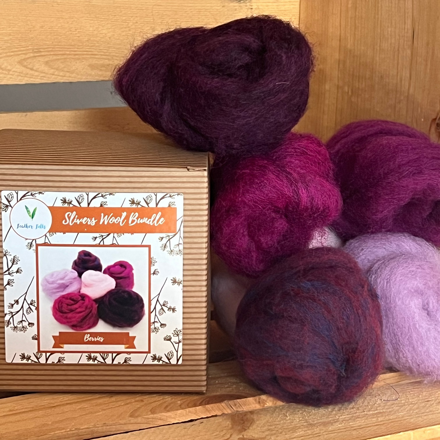 Assorted pink and purple wool bundles