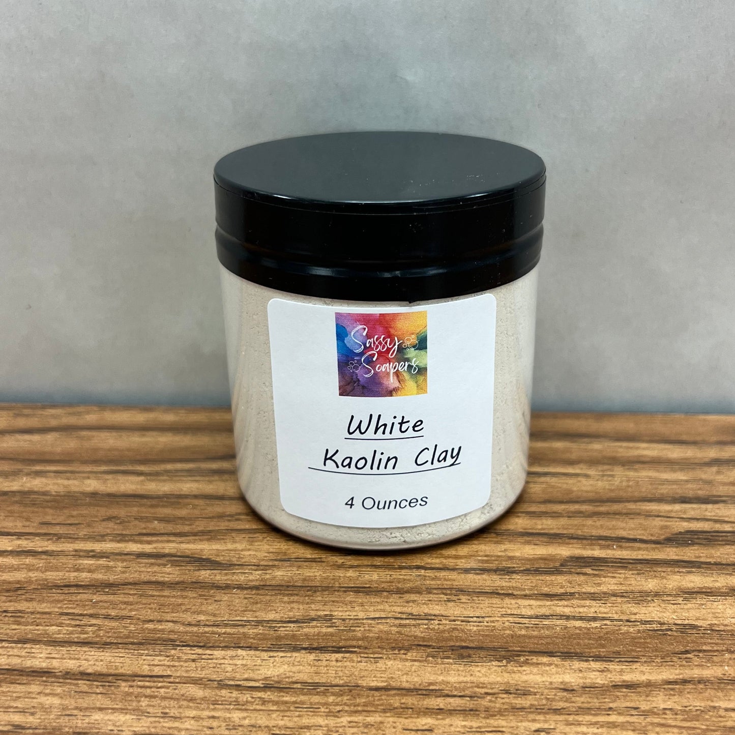 White Kaolin Clay in a 4 ounce clear pastic container.