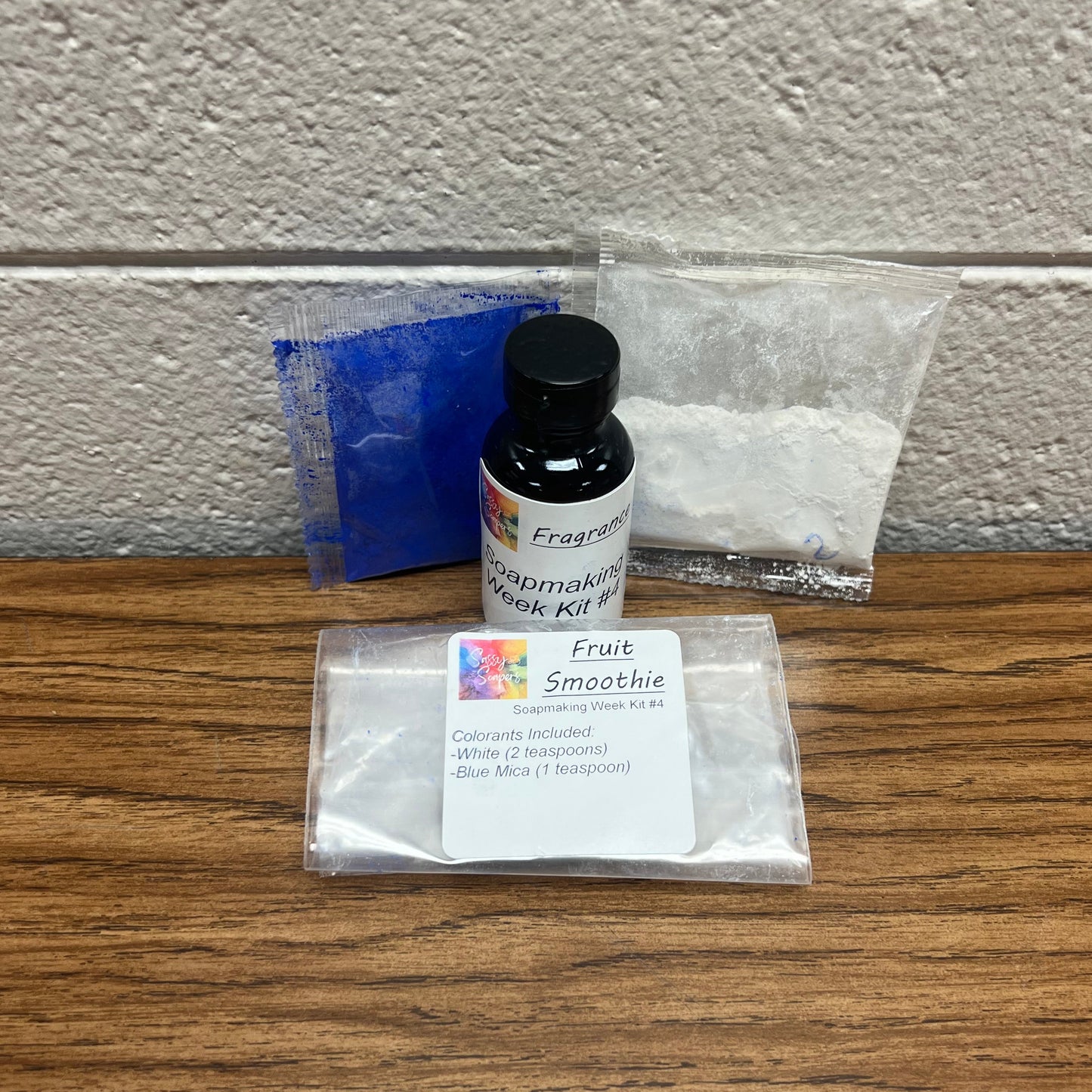 Bottle of fragrance oil and colorants for soap making