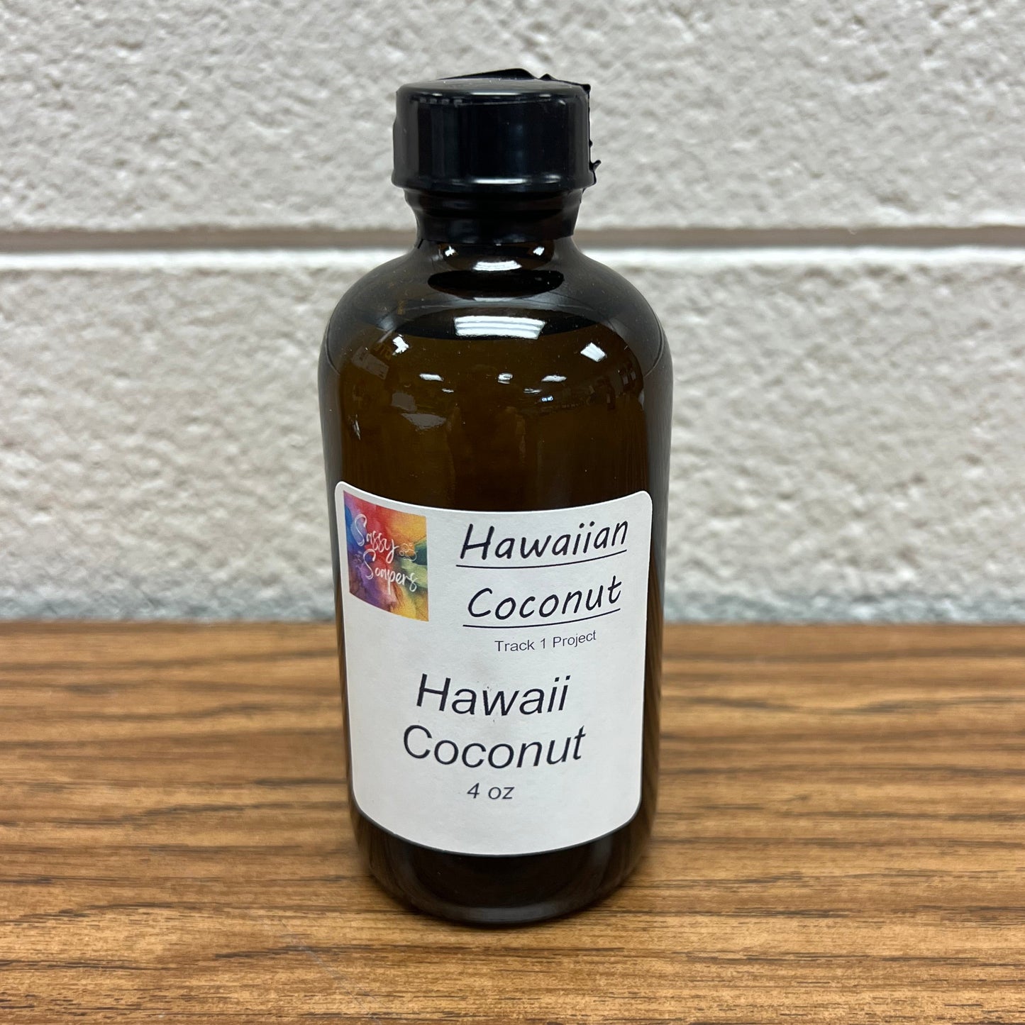 Brown 4 oz glass bottle of Hawaii Coconut Fragrance Oil.