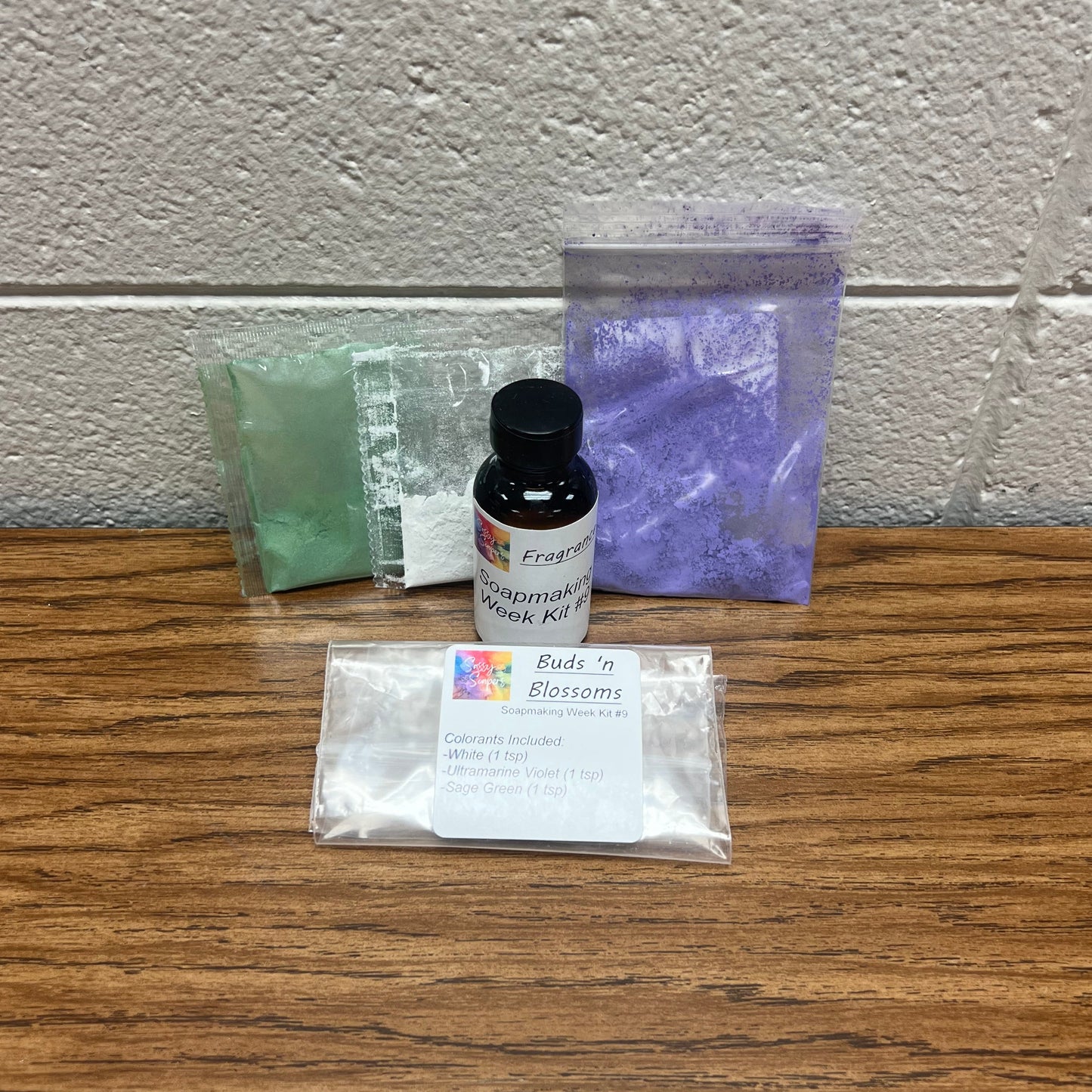 Bottle of fragrance oil and colorants for soap making