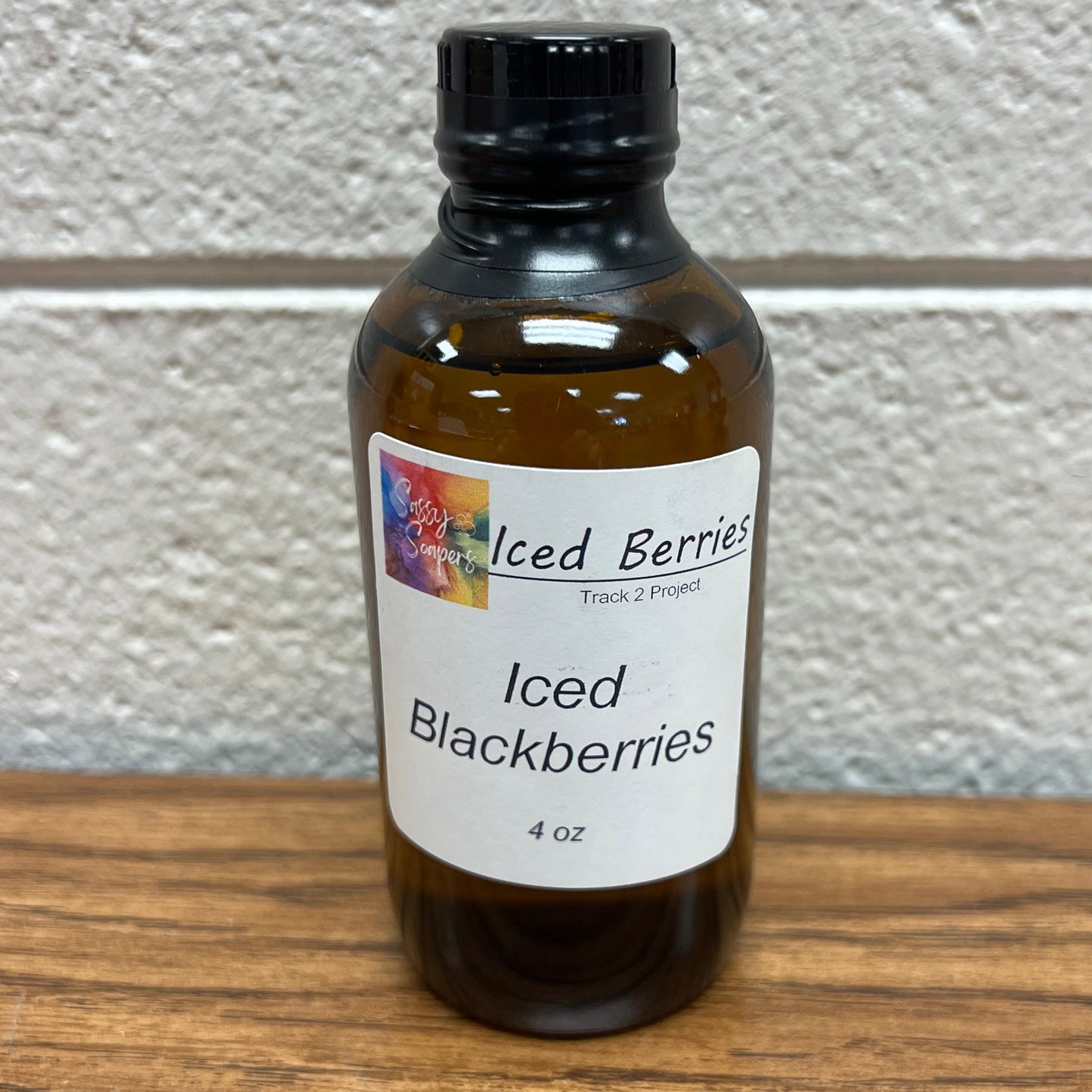 Brown 4 oz glass bottle of Iced Black Berries Fragrance Oil.
