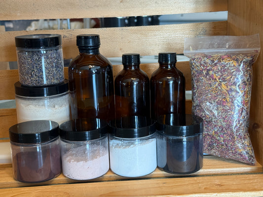 Lavender Essential oil supplies collection on a wooden shelf. 
