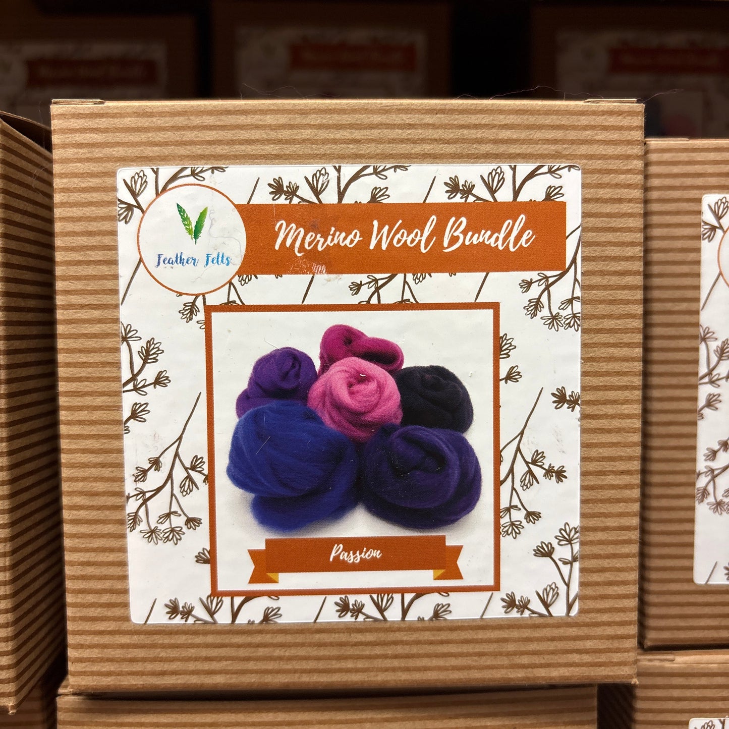 Marble Wool Bundle packaging with floral design and brand label on a cardboard box.