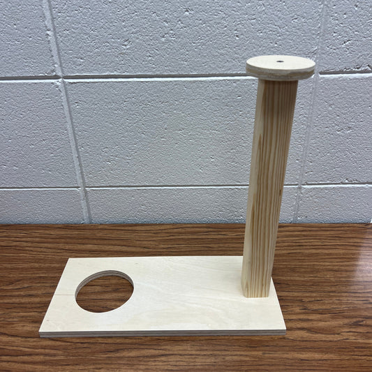 Wooden device to push soap out of a 3" pipe and remove the cap from the pipe mold.