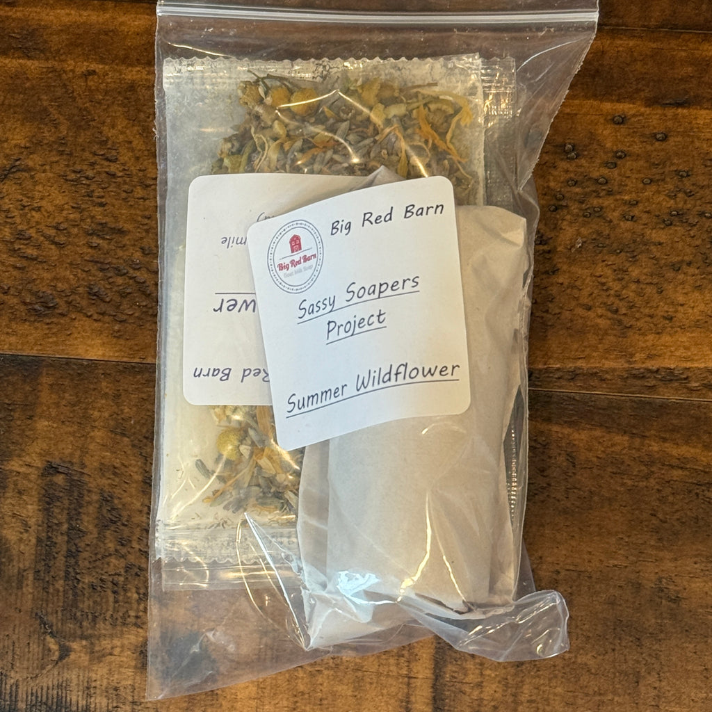 Packaged summer wildflower mix with a label on a wooden surface