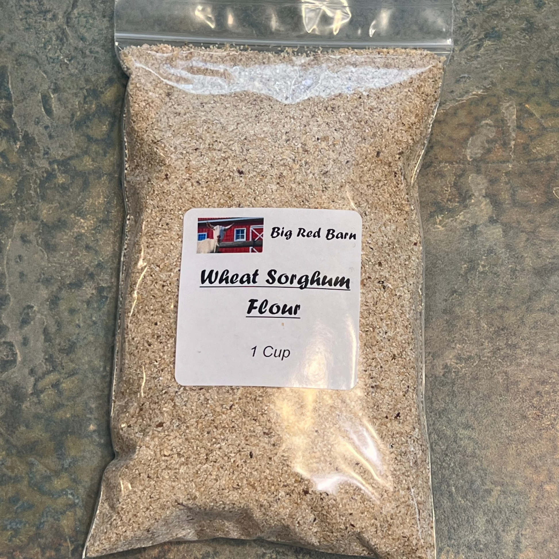 a cup of Wheat Sorghum Flour in a clear bag