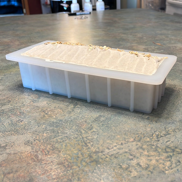 10 inch soap mold with soap in it on a countertop 